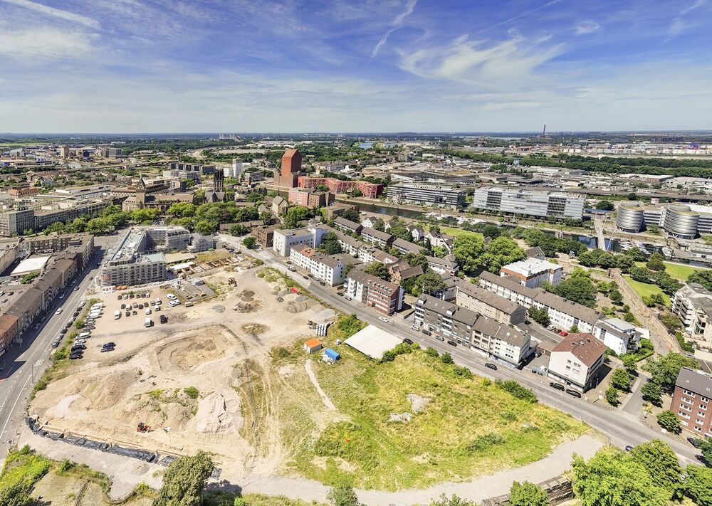 Luftaufnahme des Mercatorviertels mit Straßen und Bauprojekten.